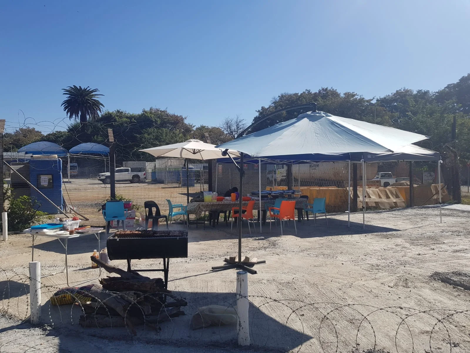 Outdoor seating and food service area at NTV